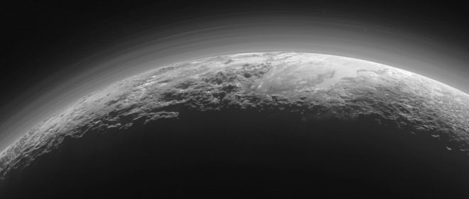 Pluto’s Majestic Mountains, Frozen Plains and Foggy Hazes. Credits: NASA/JHUAPL/SwRI
